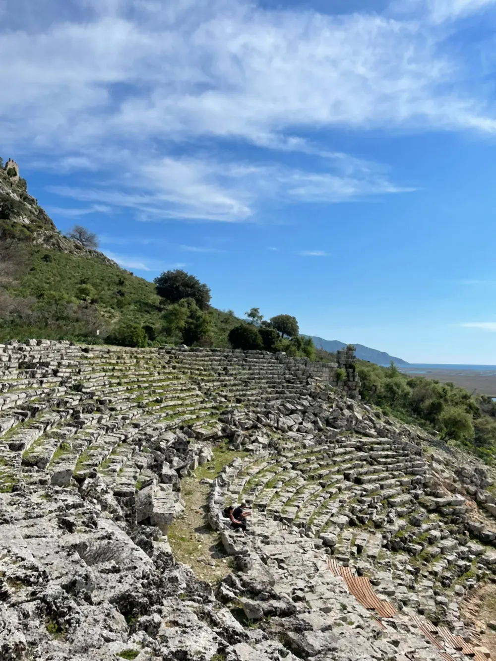 The stone seating rows of the ancient theatre at Kaunos The stone seating rows of the ancient theatre at Kaunos