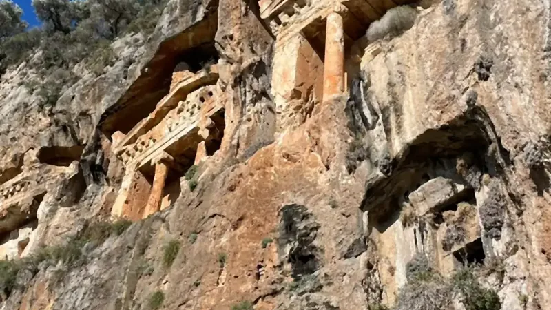 The columns and pediment of the largest Kaunos tomb from below The columns and pediment of the largest Kaunos tomb from below