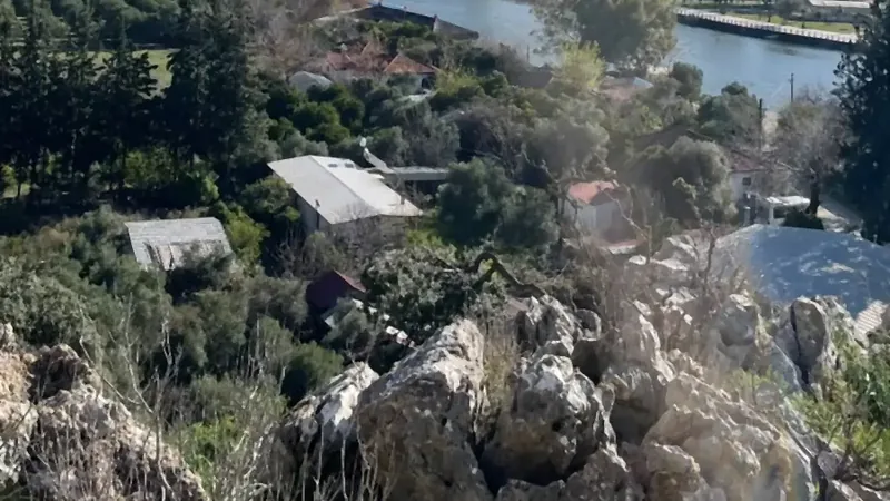 Dalyan town and the river seen from the Kaunos slope Dalyan town and the river seen from the Kaunos slope
